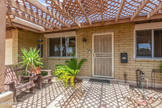 3136 W Sunnyside Ave, Phoenix, AZ 85029 - entrance to property with a pergola and a patio