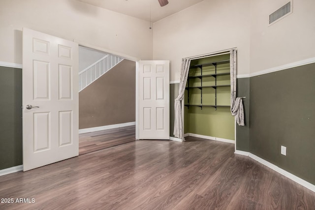845 N Oak Ct, Chandler, AZ 85226 - empty room featuring a ceiling fan, wood finished floors, and baseboards