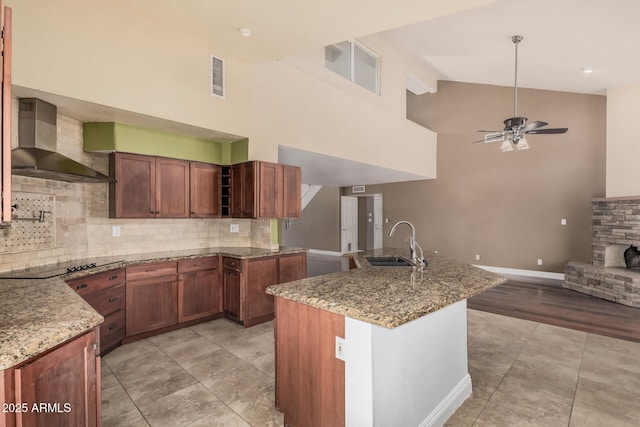 845 N Oak Ct, Chandler, AZ 85226 - kitchen with wall chimney range hood, a sink, high vaulted ceiling, a ceiling fan, and tasteful backsplash