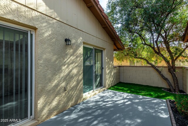 view of patio featuring a fenced backyard