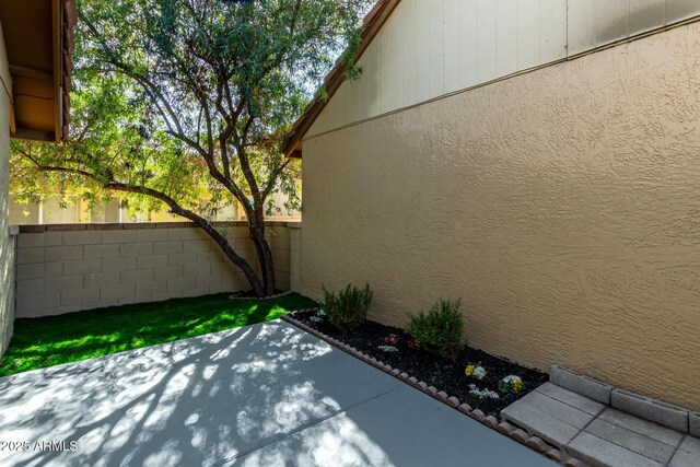 view of patio with fence