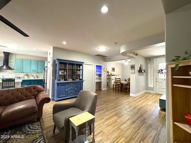 living room with light hardwood / wood-style floors