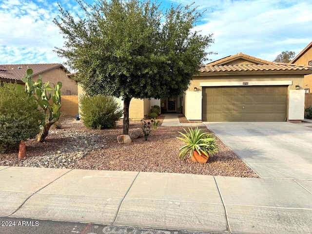 view of front of property with a garage