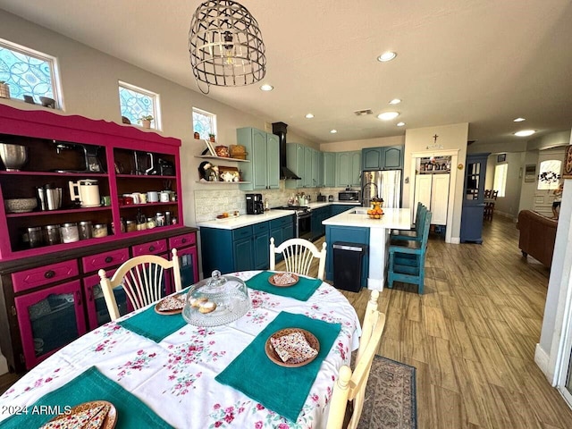 dining room featuring light hardwood / wood-style floors