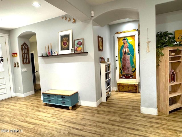 hallway featuring light hardwood / wood-style floors