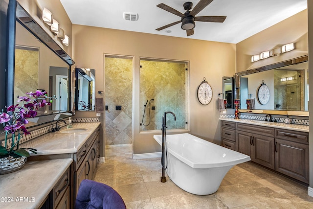 bathroom featuring vanity, shower with separate bathtub, and ceiling fan