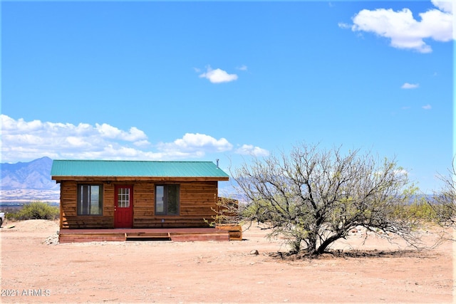 log-style house with a mountain view