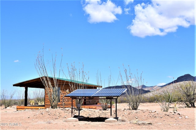 surrounding community with a mountain view