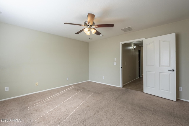 unfurnished bedroom featuring carpet flooring and ceiling fan