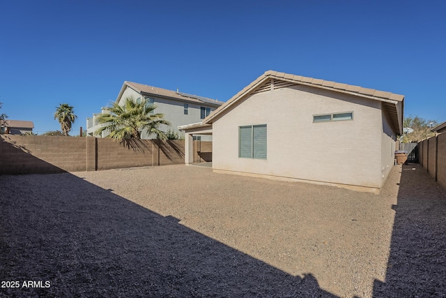 rear view of house featuring a patio area