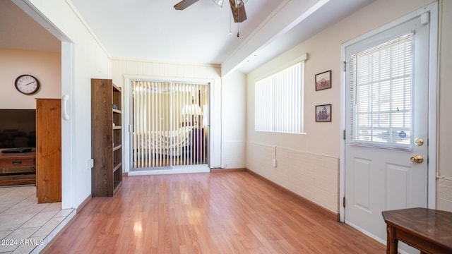 entryway featuring ceiling fan and light hardwood / wood-style flooring