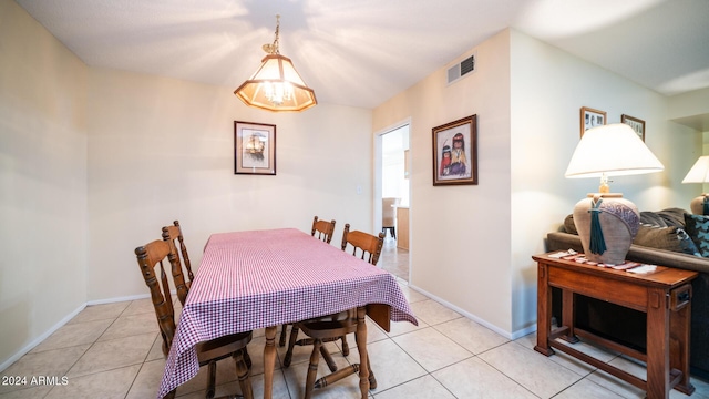 dining room with light tile patterned flooring