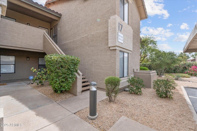 9600 N 96th St Unit 263, Scottsdale, AZ 85258 - view of property exterior featuring stucco siding