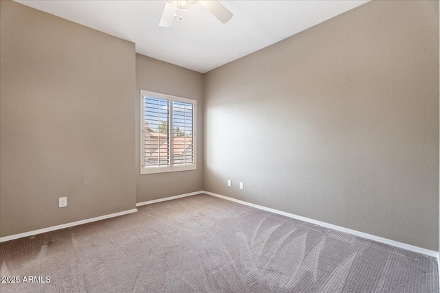 9600 N 96th St Unit 263, Scottsdale, AZ 85258 - empty room featuring carpet floors, ceiling fan, and baseboards