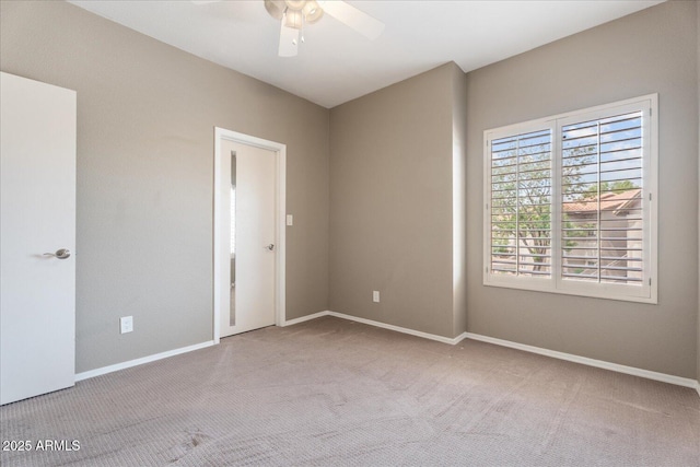 9600 N 96th St Unit 263, Scottsdale, AZ 85258 - carpeted spare room with ceiling fan and baseboards