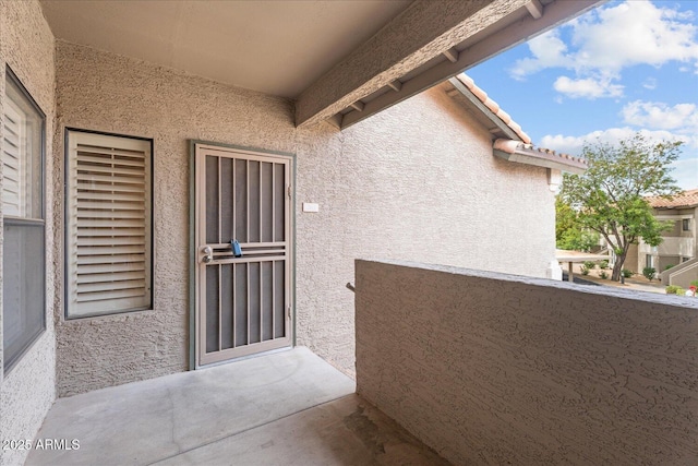 9600 N 96th St Unit 263, Scottsdale, AZ 85258 - entrance to property featuring stucco siding and a balcony