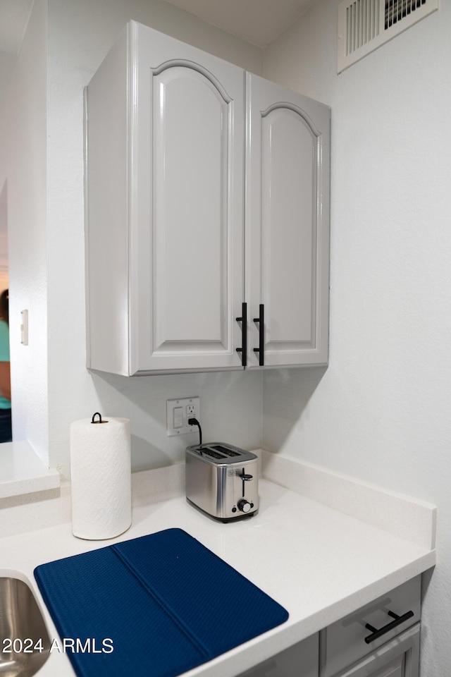 room details featuring white cabinets