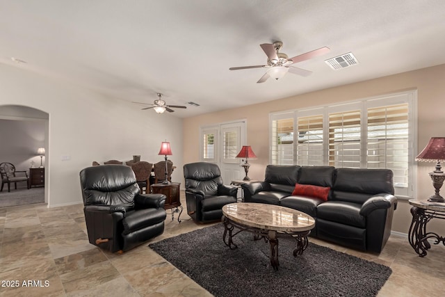 living room featuring ceiling fan