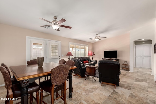 dining space featuring ceiling fan