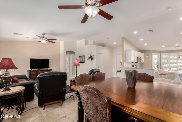 dining area with lofted ceiling and ceiling fan