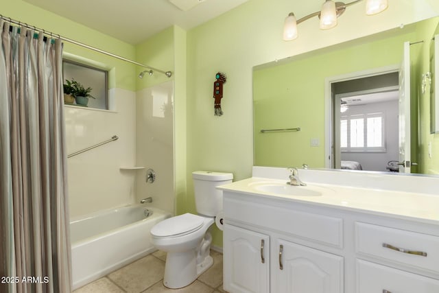 full bathroom with shower / tub combo, vanity, tile patterned floors, and toilet