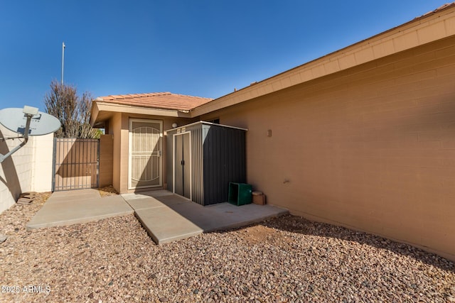 view of side of property with a patio area