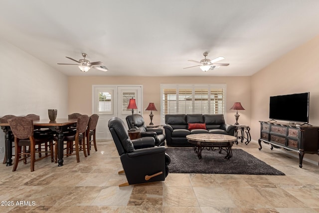 living room with ceiling fan