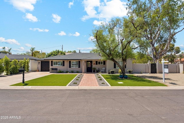 3201 E Colter St, Phoenix, AZ 85018 - ranch-style house with concrete driveway and an attached garage