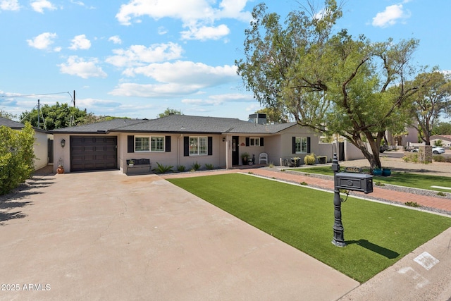 3201 E Colter St, Phoenix, AZ 85018 - single story home featuring a garage, concrete driveway, and a front lawn