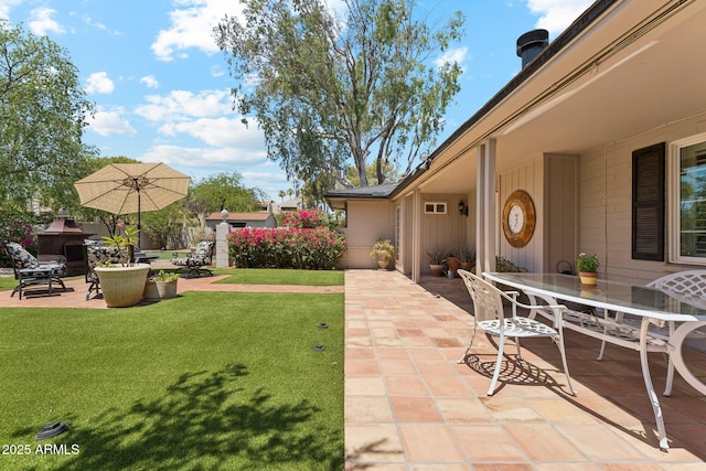 3201 E Colter St, Phoenix, AZ 85018 - view of green lawn featuring a patio area and outdoor dining area