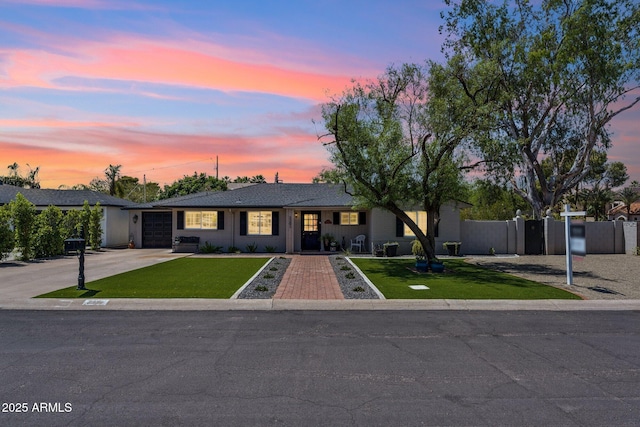 3201 E Colter St, Phoenix, AZ 85018 - ranch-style home featuring driveway and an attached garage