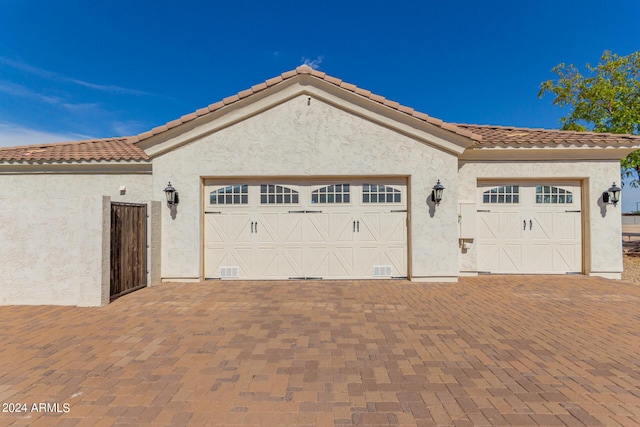 garage featuring driveway