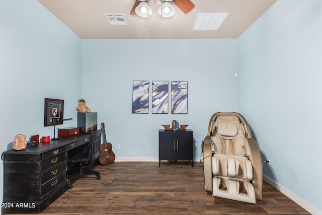 office area featuring visible vents, a ceiling fan, baseboards, and wood finished floors
