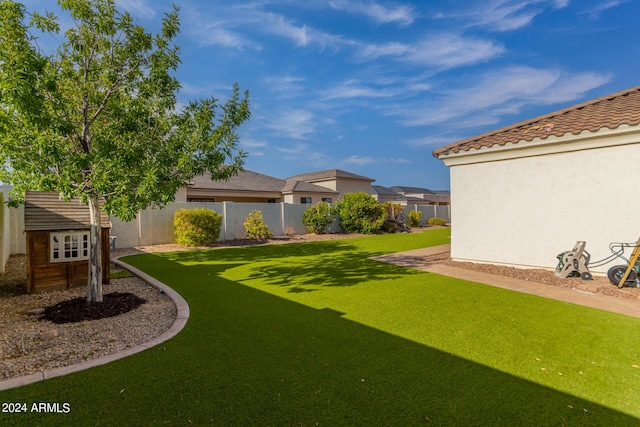 view of yard featuring fence