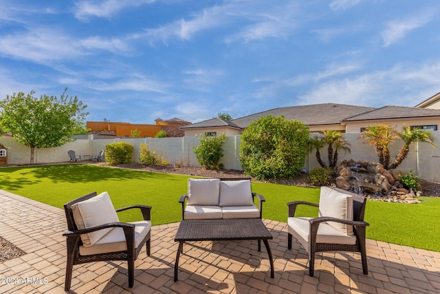 view of patio / terrace with a fenced backyard and outdoor lounge area