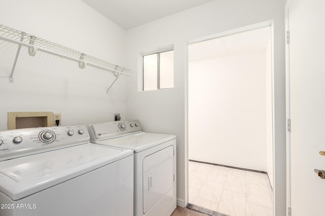 laundry area with washer and dryer and laundry area