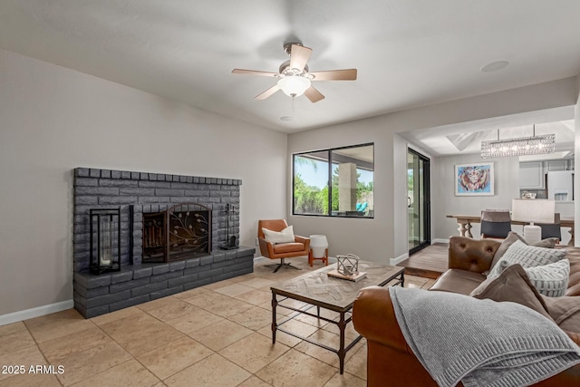 6417 E Kings Ave, Scottsdale, AZ 85254 - living area featuring ceiling fan and a fireplace
