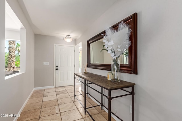 6417 E Kings Ave, Scottsdale, AZ 85254 - foyer with baseboards and stone tile floors