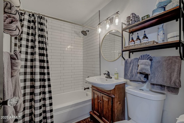 bathroom with shower / bath combination with curtain, vanity, and toilet