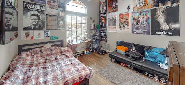 bedroom with light hardwood / wood-style flooring