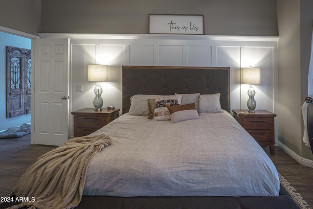 bedroom featuring dark hardwood / wood-style floors