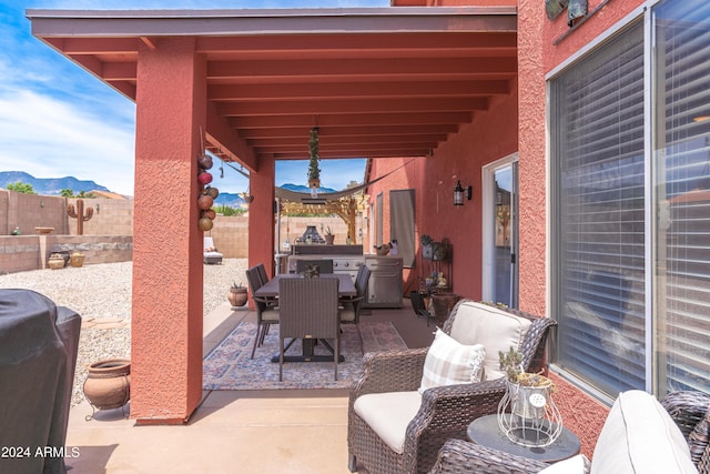 view of patio featuring a mountain view