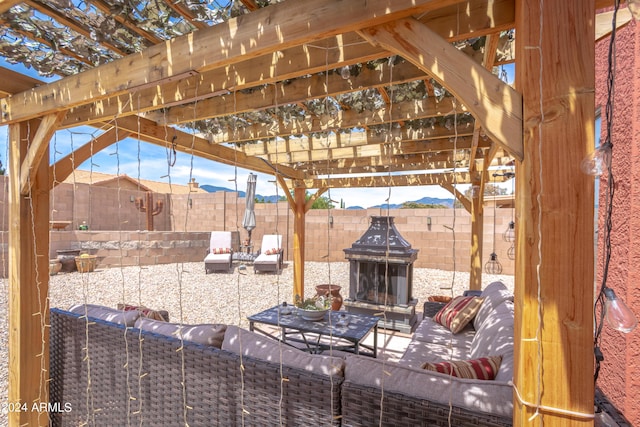 view of patio / terrace with a pergola and outdoor lounge area