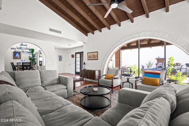 living room featuring wood ceiling, ceiling fan, hardwood / wood-style flooring, high vaulted ceiling, and beamed ceiling