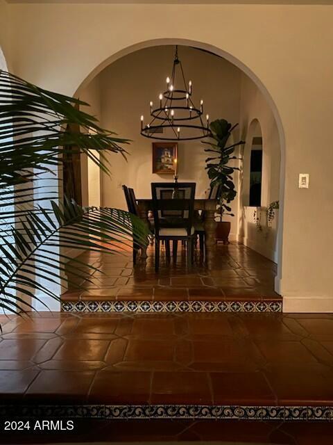 dining room featuring a notable chandelier