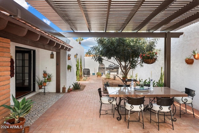 view of patio / terrace featuring a pergola