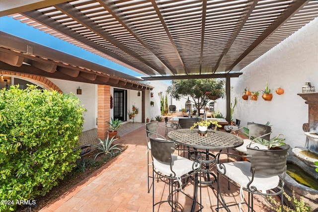 view of patio featuring a pergola