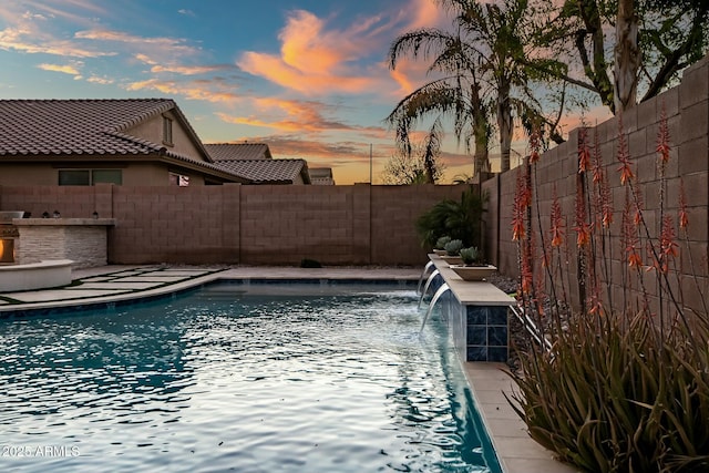 view of swimming pool with a fenced backyard and a fenced in pool