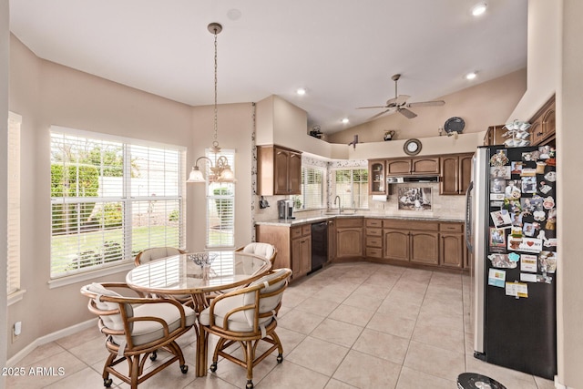 7648 W Mauna Loa Ln, Peoria, AZ 85381 - kitchen featuring freestanding refrigerator, a ceiling fan, black dishwasher, light countertops, and lofted ceiling