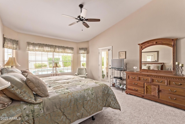 7648 W Mauna Loa Ln, Peoria, AZ 85381 - bedroom with light carpet, multiple windows, lofted ceiling, and a ceiling fan